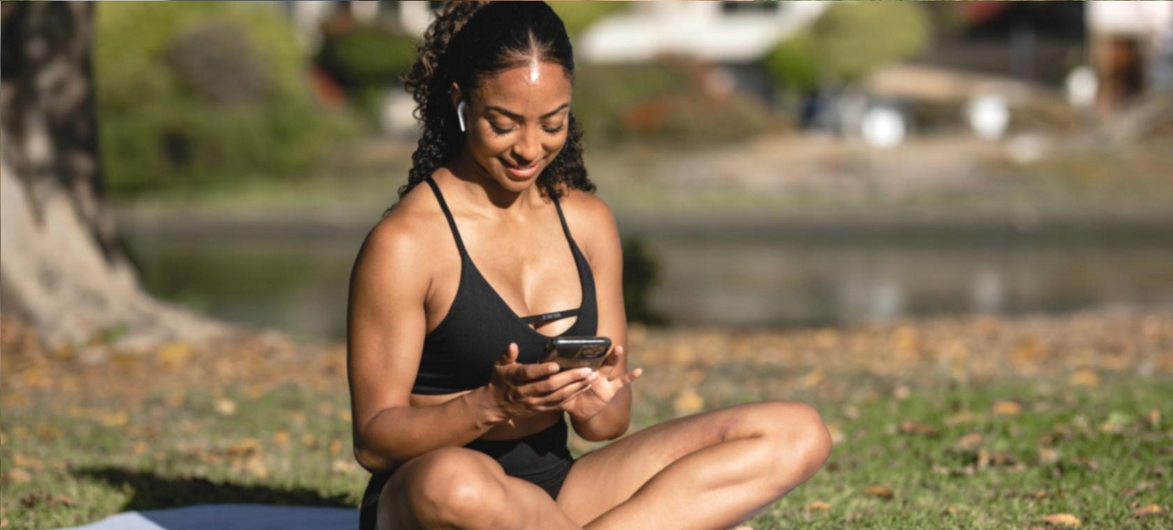 Instructor demonstrating a hatha yoga pose during a live group session